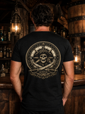 Compass and Cutlass pirate skull back print tee worn in a lantern-lit tavern